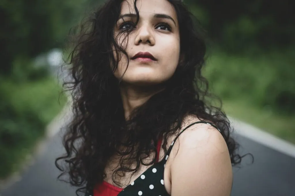 Indian woman with long, defined natural curls