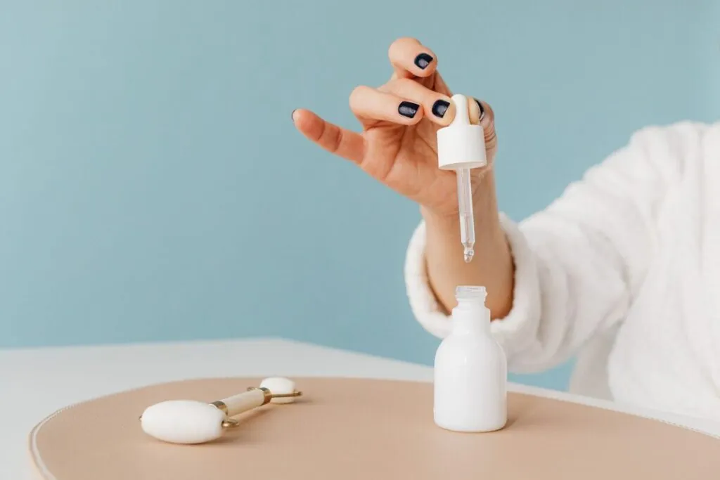 Serum bottle with a dropper on a table
